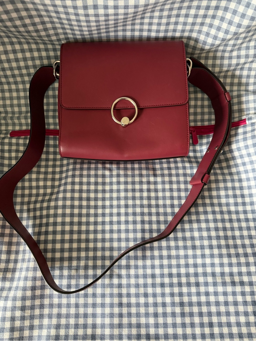 Women’s Bally Burgundy Leather Crossbody Bag with Silver Ring Accent.  Like new.